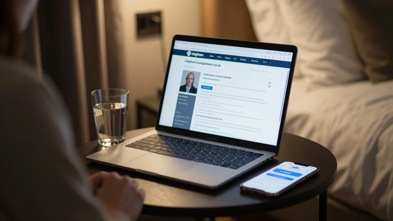 A hotel room in Clapham with evidence of a discreet, professional escort booking: digital payment and review site on screen.